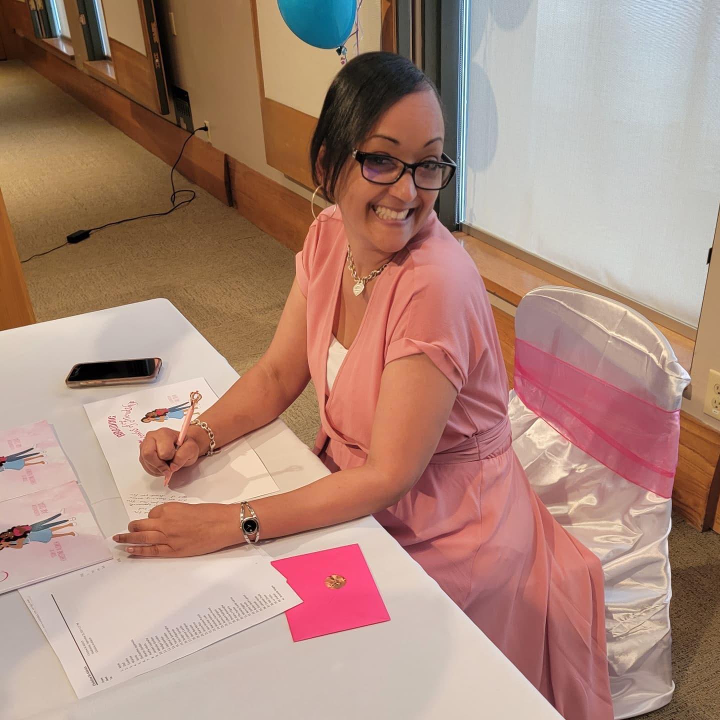 Author Christine signing books